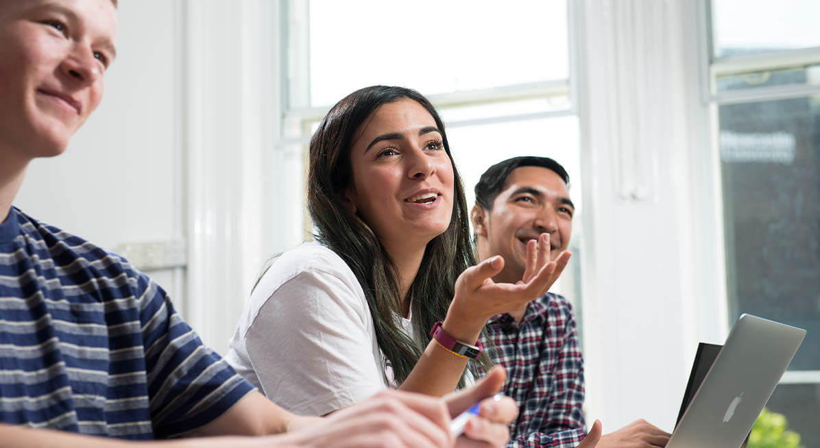 Students have a discussion during a seminar